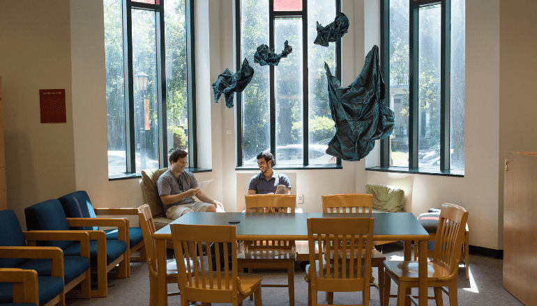 Online students meeting at Loyola's library.